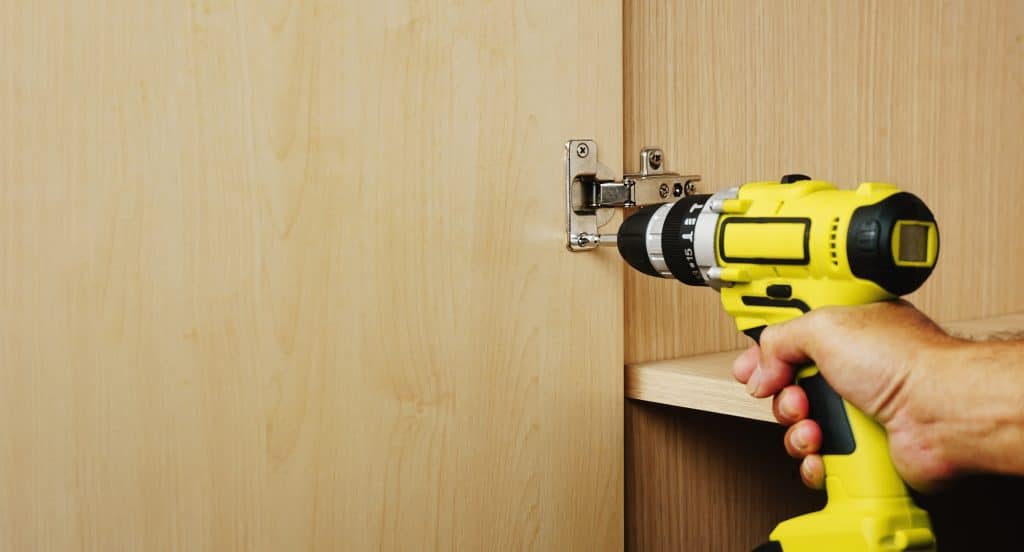  how to fix a loose cabinet door​